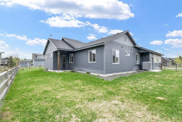 1112 Mos Way, Mccall, ID 83638 - rear view of house with central AC and board and batten siding