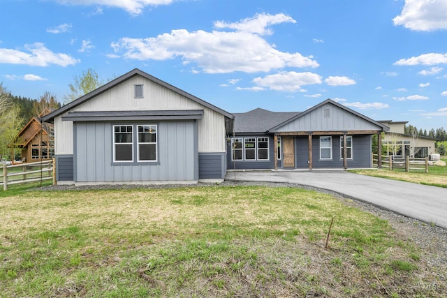 1112 Mos Way, Mccall, ID 83638 - view of front of home with board and batten siding and driveway