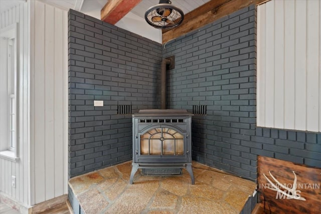 12091 Long St, Middleton, ID 83644 - detailed view of a wood stove and brick wall