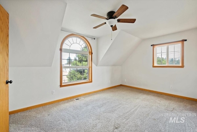 12091 Long St, Middleton, ID 83644 - additional living space with carpet, baseboards, vaulted ceiling, and a ceiling fan