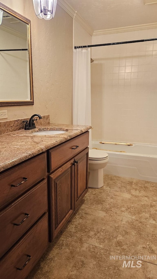 full bathroom with ornamental molding, toilet, shower / bath combination with curtain, vanity, and a textured wall
