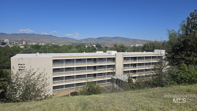 view of building exterior with a mountain view