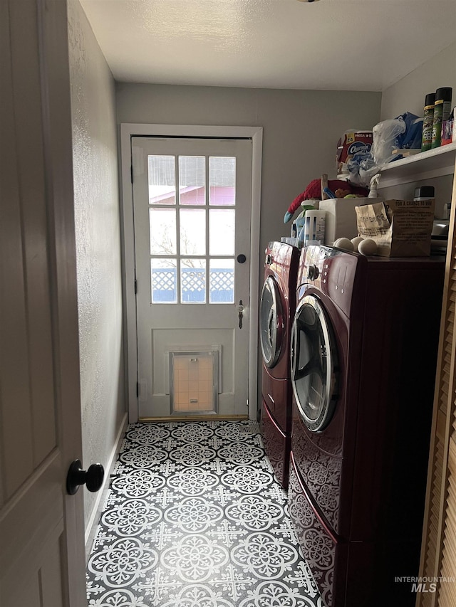 laundry area featuring washer and clothes dryer