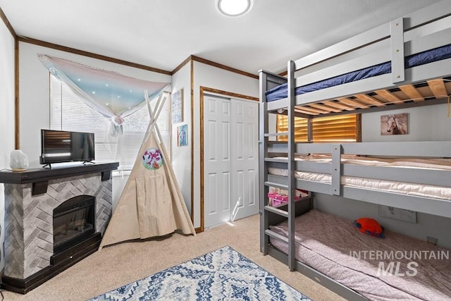 carpeted bedroom featuring a closet