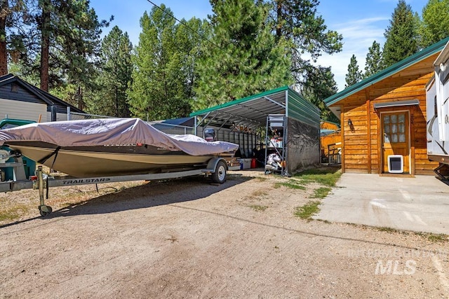 exterior space with a carport