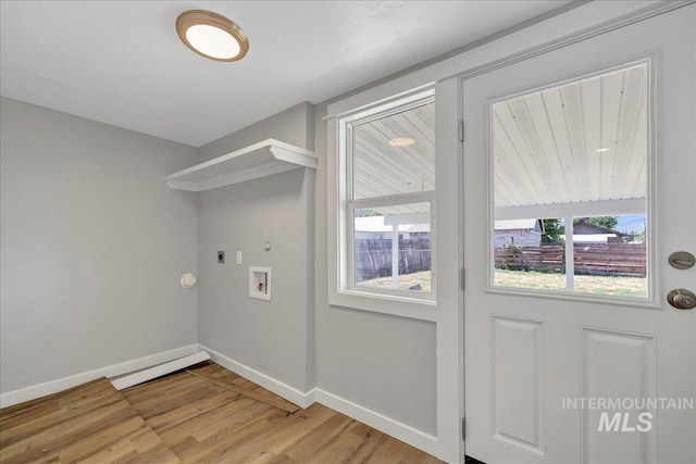414 Yakima Ave, Filer, ID 83328 - washroom with hookup for an electric dryer, light wood-style flooring, and hookup for a washing machine