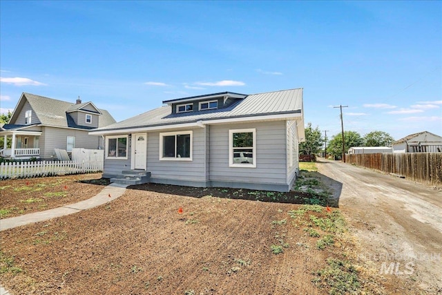 414 Yakima Ave, Filer, ID 83328 - bungalow featuring a metal roof and dirt driveway