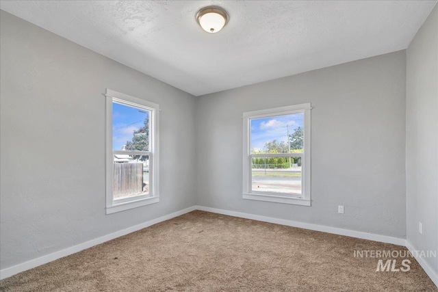 414 Yakima Ave, Filer, ID 83328 - carpeted empty room with baseboards