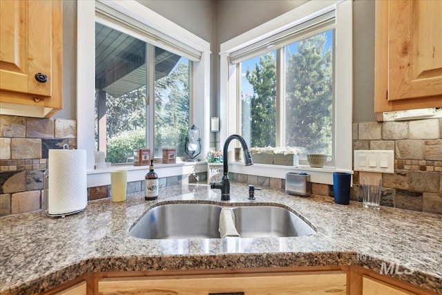 45 Ridge Loop, Jerome, ID 83338 - kitchen with backsplash, stone countertops, and light brown cabinetry