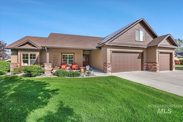45 Ridge Loop, Jerome, ID 83338 - craftsman-style house with a front lawn, solar panels, driveway, stone siding, and an attached garage