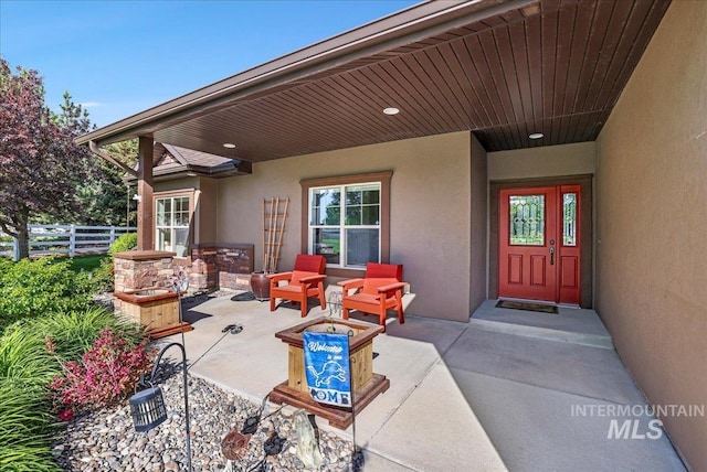 45 Ridge Loop, Jerome, ID 83338 - property entrance with stucco siding and a patio area