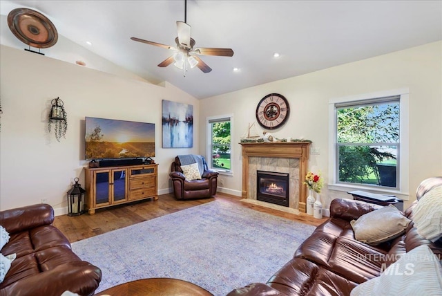 45 Ridge Loop, Jerome, ID 83338 - living area with plenty of natural light, ceiling fan, lofted ceiling, a fireplace, and wood finished floors