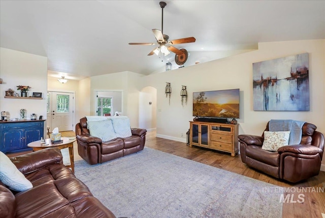 45 Ridge Loop, Jerome, ID 83338 - living area featuring arched walkways, wood finished floors, ceiling fan, and vaulted ceiling
