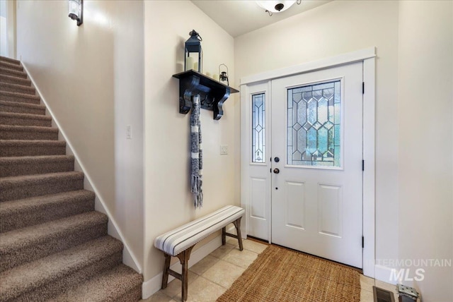 45 Ridge Loop, Jerome, ID 83338 - foyer featuring stairway and light tile patterned floors