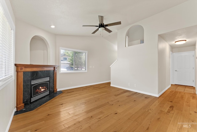 1406 W Wright St, Boise, ID 83705 - unfurnished living room featuring a fireplace, light wood-style flooring, ceiling fan, baseboards, and recessed lighting