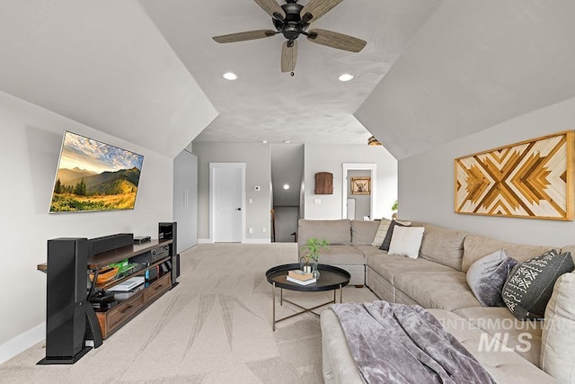 carpeted living room featuring recessed lighting, baseboards, and a ceiling fan