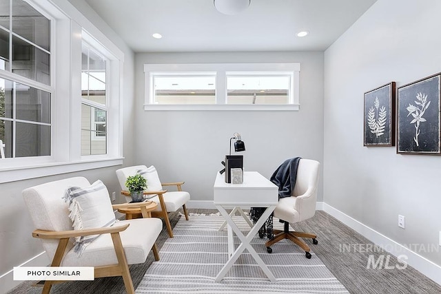 home office featuring a wealth of natural light, recessed lighting, and baseboards