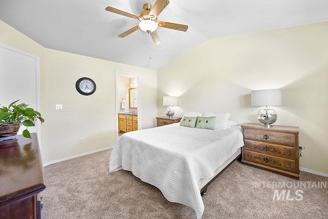 2189 W Rainfall St, Meridian, ID 83646 - carpeted bedroom featuring vaulted ceiling, baseboards, ensuite bathroom, and ceiling fan