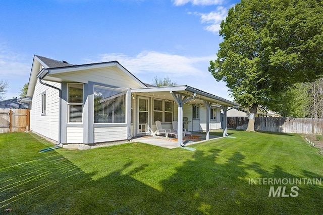 2189 W Rainfall St, Meridian, ID 83646 - rear view of house featuring a patio