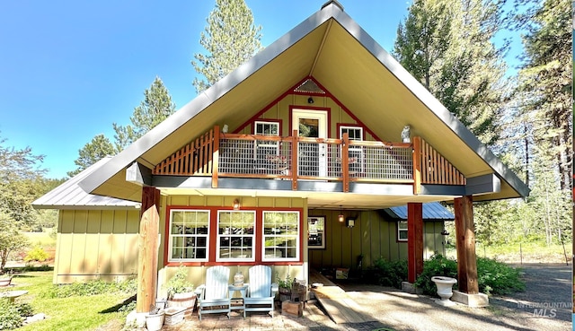 3617 Rubicon St, New Meadows, ID 83612 - rear view of property featuring board and batten siding and a balcony