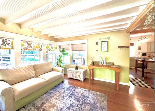 3617 Rubicon St, New Meadows, ID 83612 - living area featuring wood finished floors, beamed ceiling, and baseboards