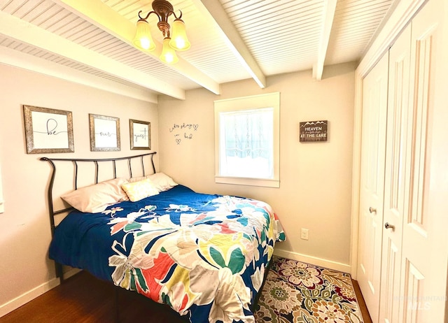 3617 Rubicon St, New Meadows, ID 83612 - bedroom featuring beamed ceiling, baseboards, a chandelier, and a closet