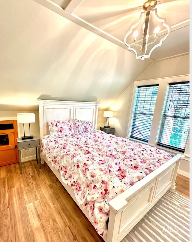 3617 Rubicon St, New Meadows, ID 83612 - bedroom featuring light wood-style flooring, a chandelier, and lofted ceiling