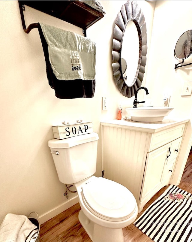 3617 Rubicon St, New Meadows, ID 83612 - half bathroom with wood finished floors, baseboards, and toilet