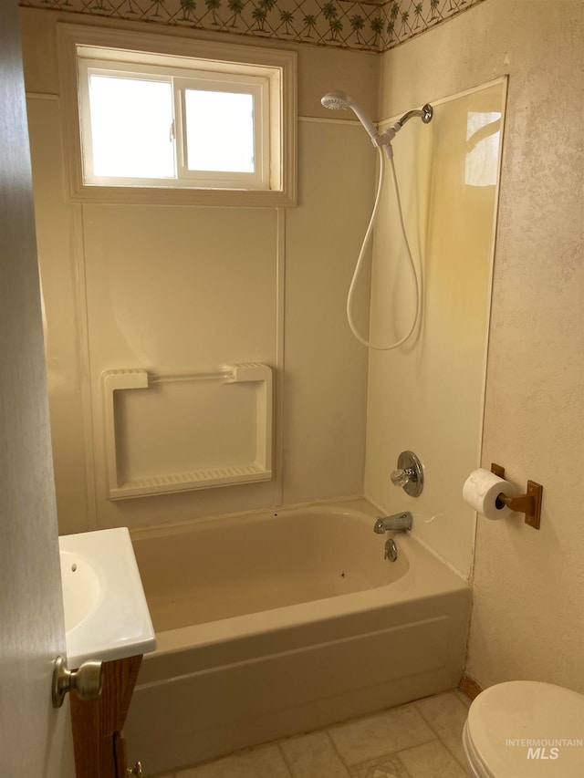 full bathroom with vanity, toilet, and shower / washtub combination