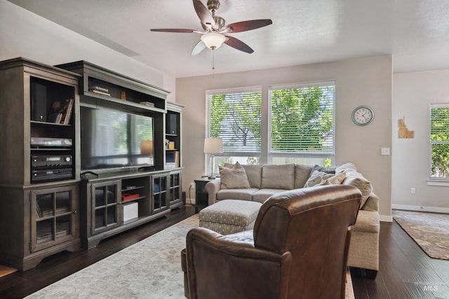 12022 W Ardyce, Boise, ID 83713 - living area with ceiling fan, healthy amount of natural light, and dark wood-style floors