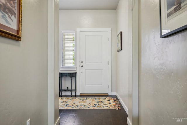 12022 W Ardyce, Boise, ID 83713 - doorway with hardwood / wood-style flooring and baseboards