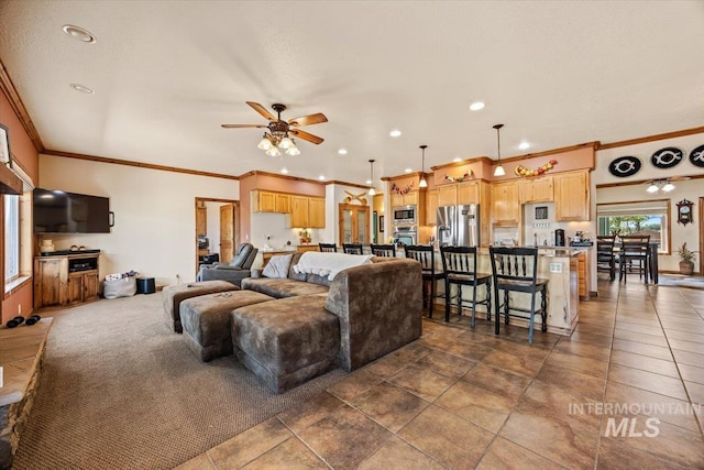 1770 N 3rd St, Nyssa, OR 97913 - living room featuring ceiling fan, crown molding, and recessed lighting
