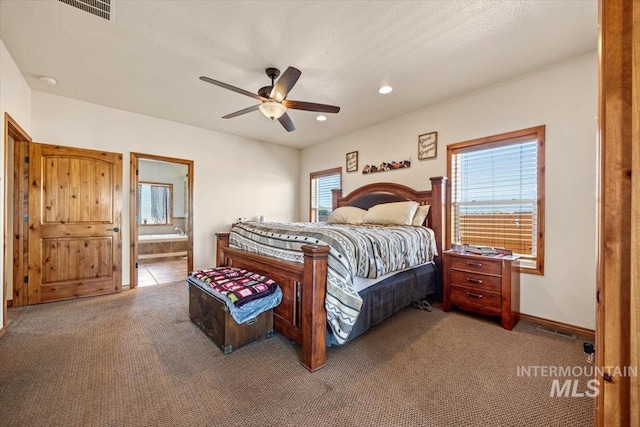 1770 N 3rd St, Nyssa, OR 97913 - bedroom with carpet floors, recessed lighting, connected bathroom, a ceiling fan, and baseboards