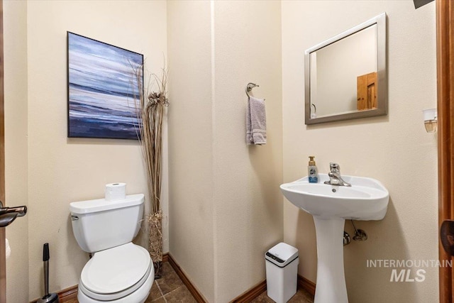 1770 N 3rd St, Nyssa, OR 97913 - bathroom with toilet and baseboards