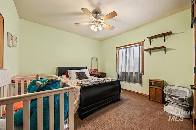 1770 N 3rd St, Nyssa, OR 97913 - carpeted bedroom with a ceiling fan and baseboards