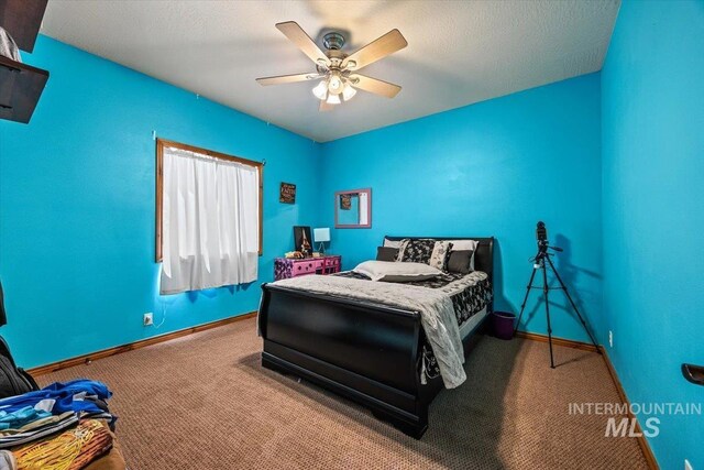 1770 N 3rd St, Nyssa, OR 97913 - bedroom featuring baseboards, carpet flooring, and ceiling fan