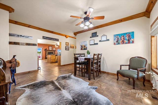 1770 N 3rd St, Nyssa, OR 97913 - tiled dining space featuring ceiling fan, baseboards, and ornamental molding