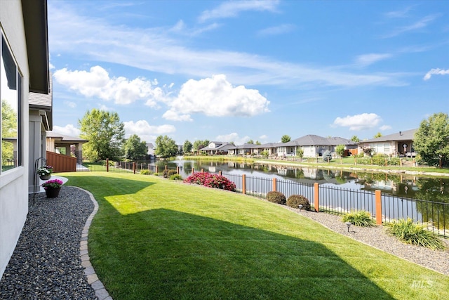 view of yard with a water view