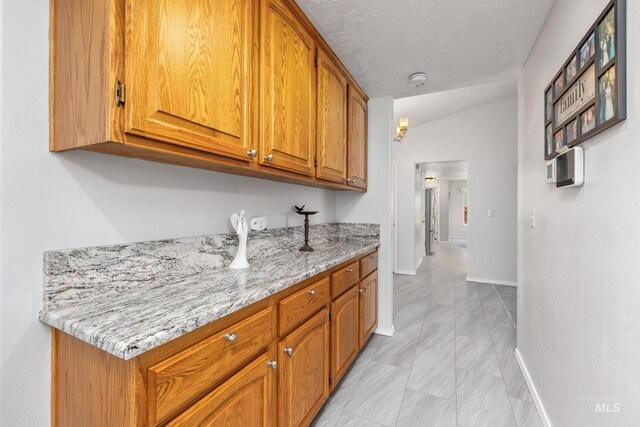 bar featuring baseboards