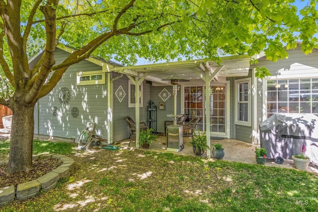 rear view of property with a patio area