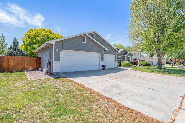 view of front of property featuring an attached garage, driveway, and brick siding