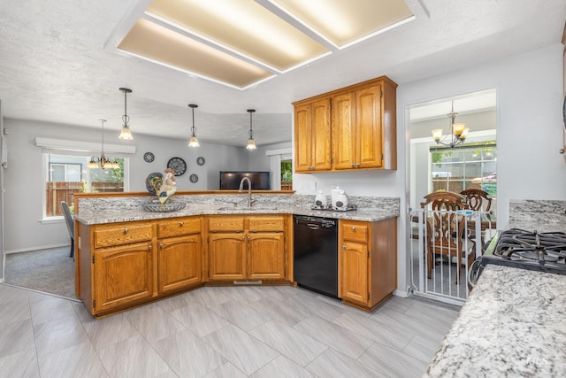 kitchen featuring black appliances, a chandelier, a peninsula, and brown cabinetry