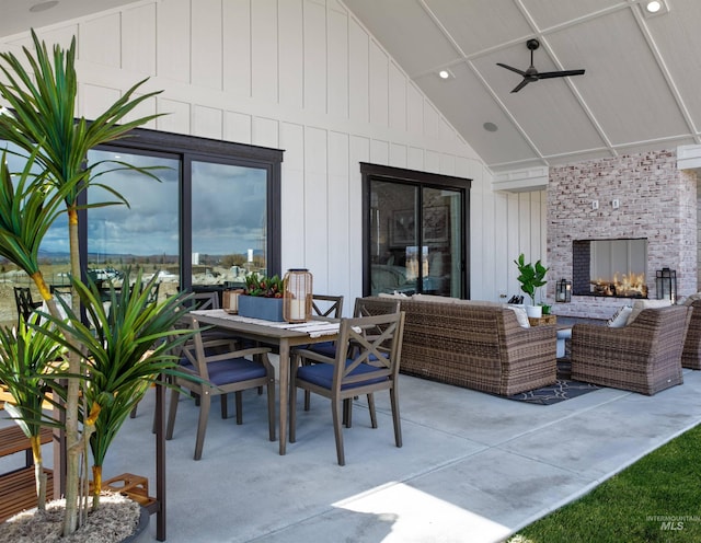 view of patio / terrace with outdoor dining area, a ceiling fan, and outdoor lounge area