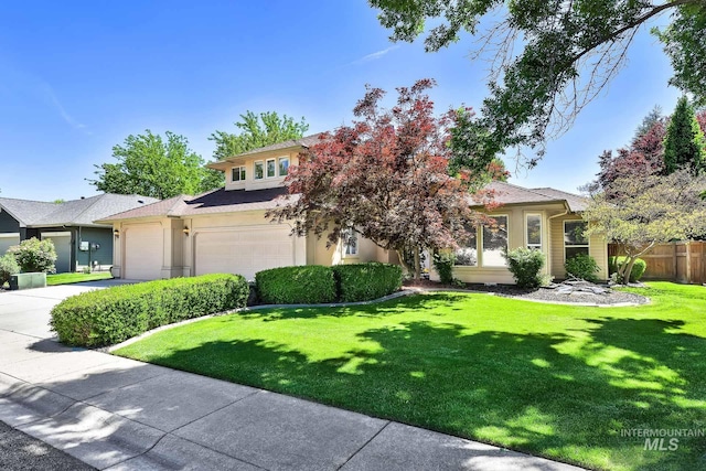 obstructed view of property featuring driveway and an attached garage