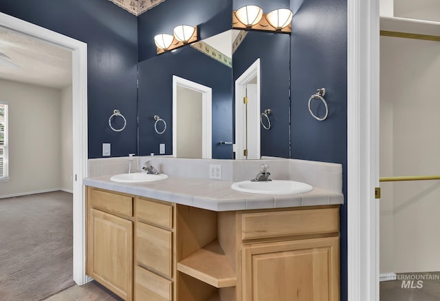 bathroom featuring double vanity