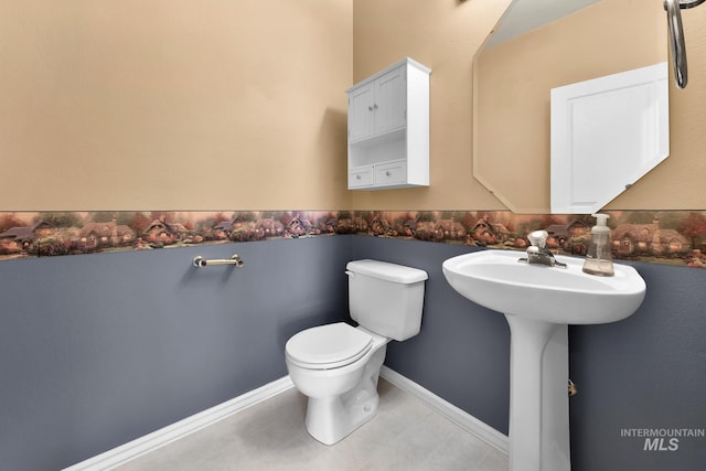half bathroom with toilet