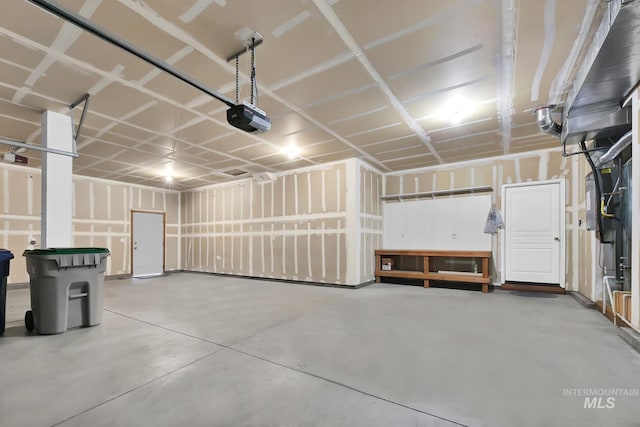 garage featuring a garage door opener