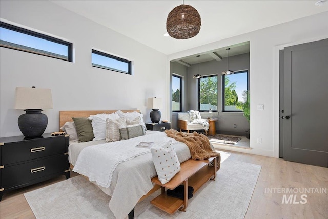 1948 Red Rock Way, Twin Falls, ID 83301 - bedroom featuring light wood-style floors and beamed ceiling