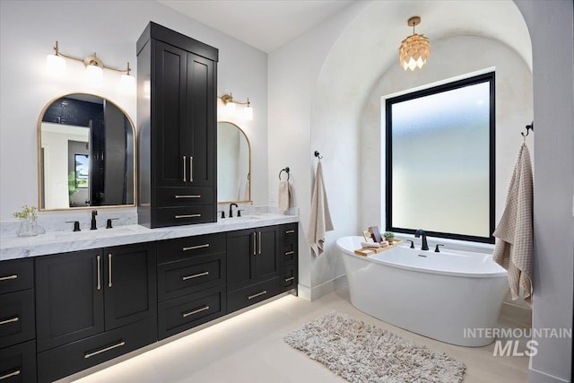1948 Red Rock Way, Twin Falls, ID 83301 - full bath featuring double vanity, a soaking tub, and tile patterned floors