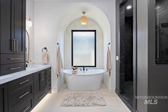 1948 Red Rock Way, Twin Falls, ID 83301 - bathroom featuring a soaking tub, vanity, and walk in shower